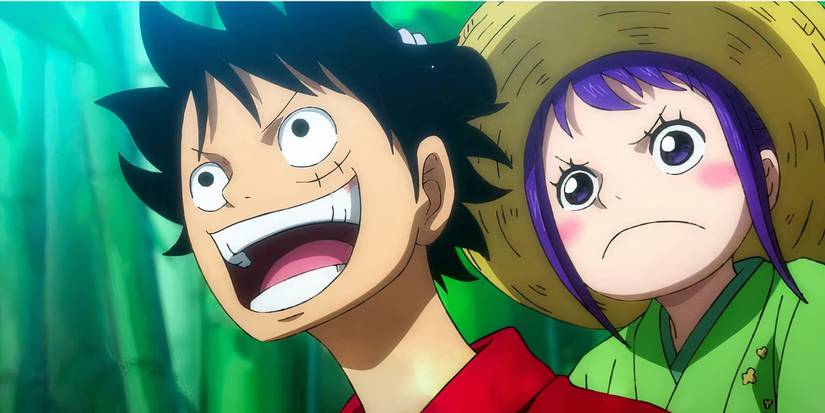 Luffy smiles while carrying O-Tama on his back in One Piece. 