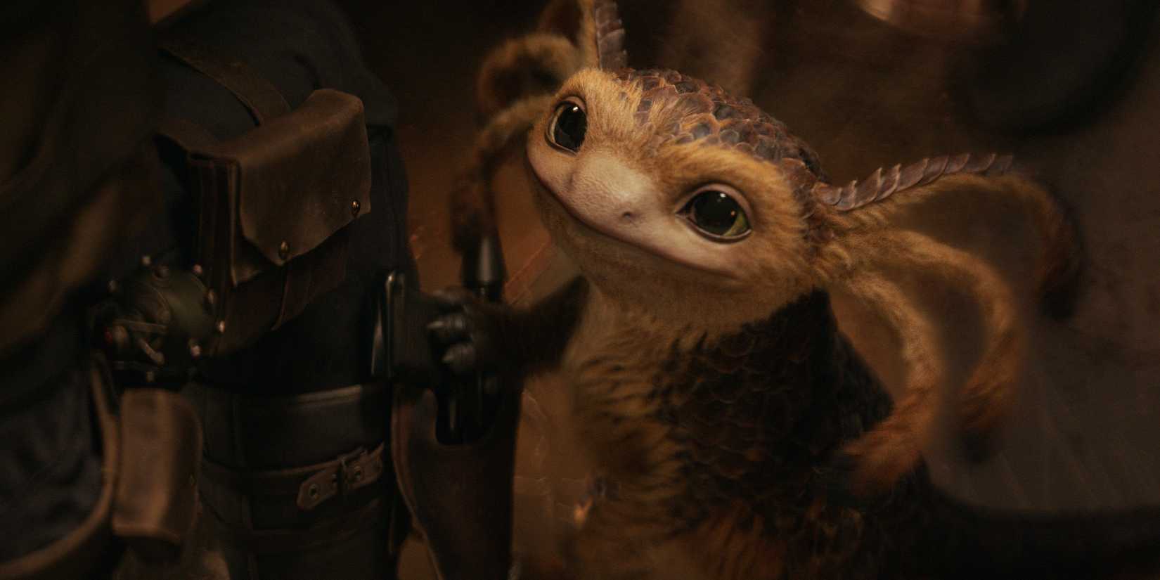 Nix looking up at Kay in Star Wars Outlaws