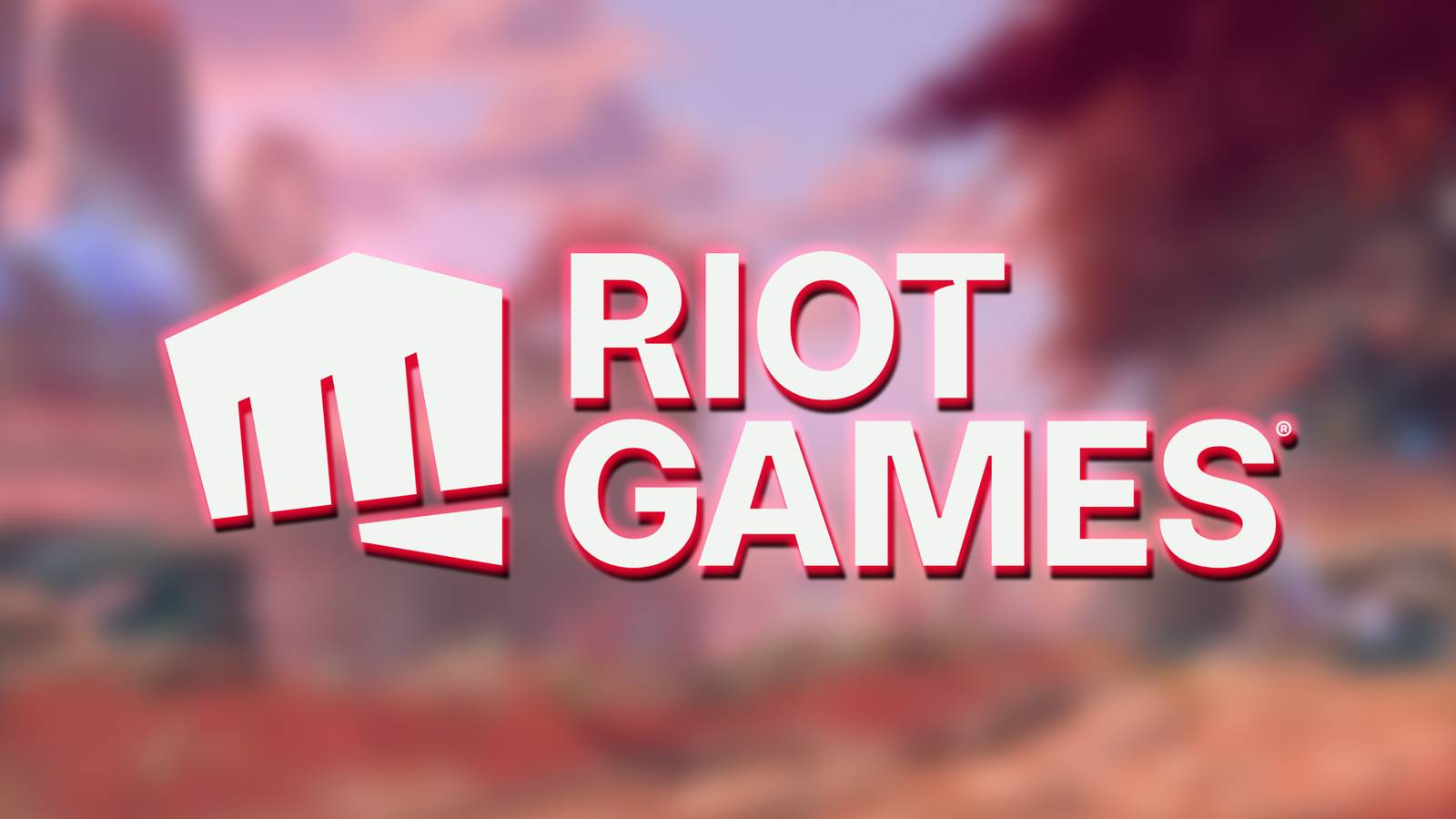 Riot Games logo on blurred 2XKO arena environment artwork