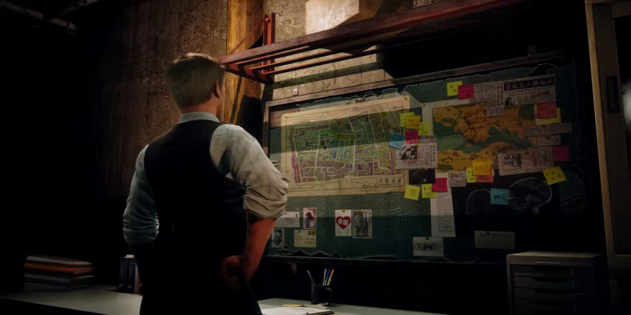 Sliiterhead trailer screenshot: detective looking at the clue board