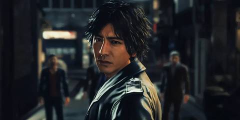 Takayuki Yagami in Judgment, looking out at the camera and posing in black attire