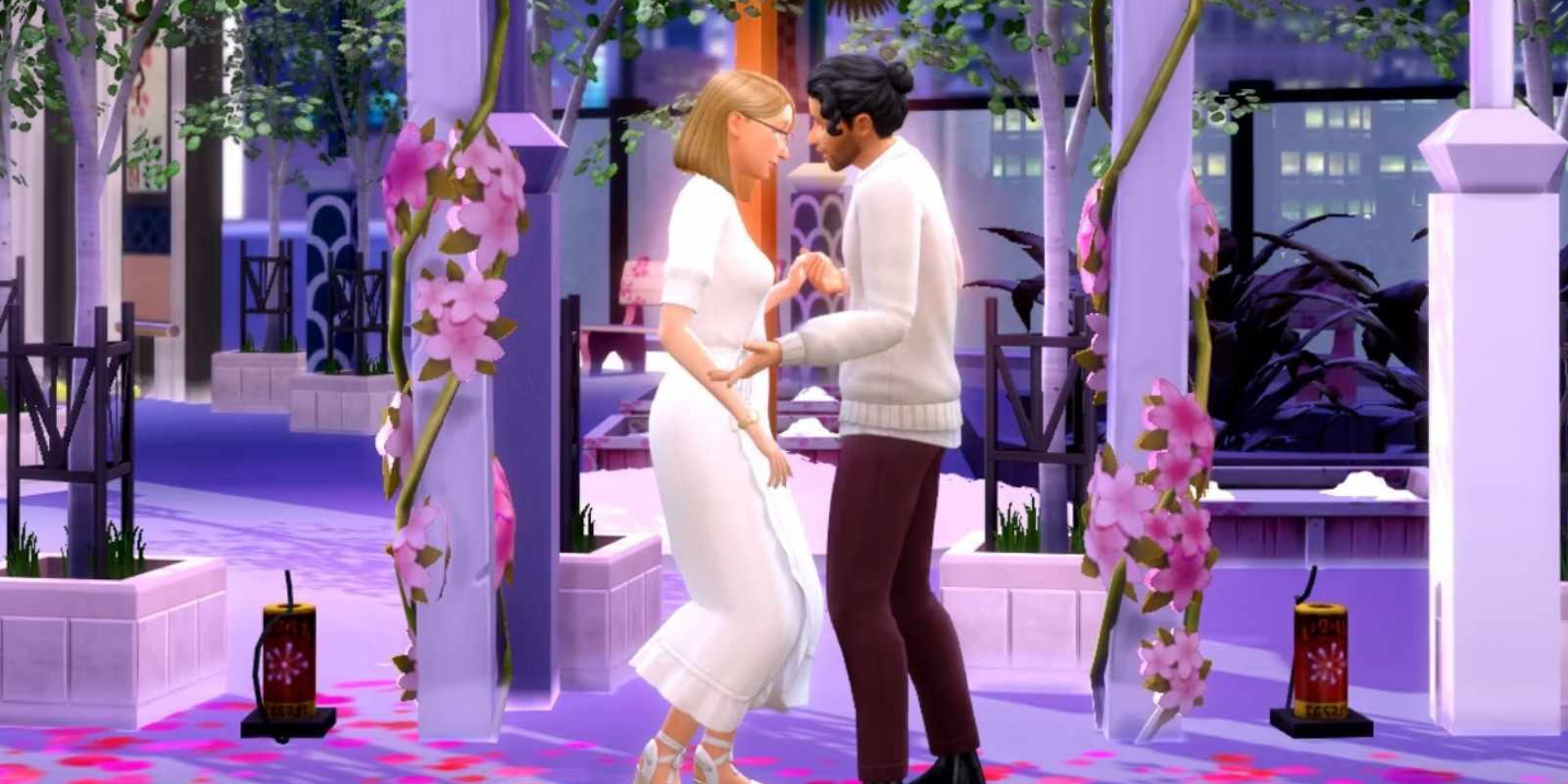 2 Sims kissing in front of a romantic background