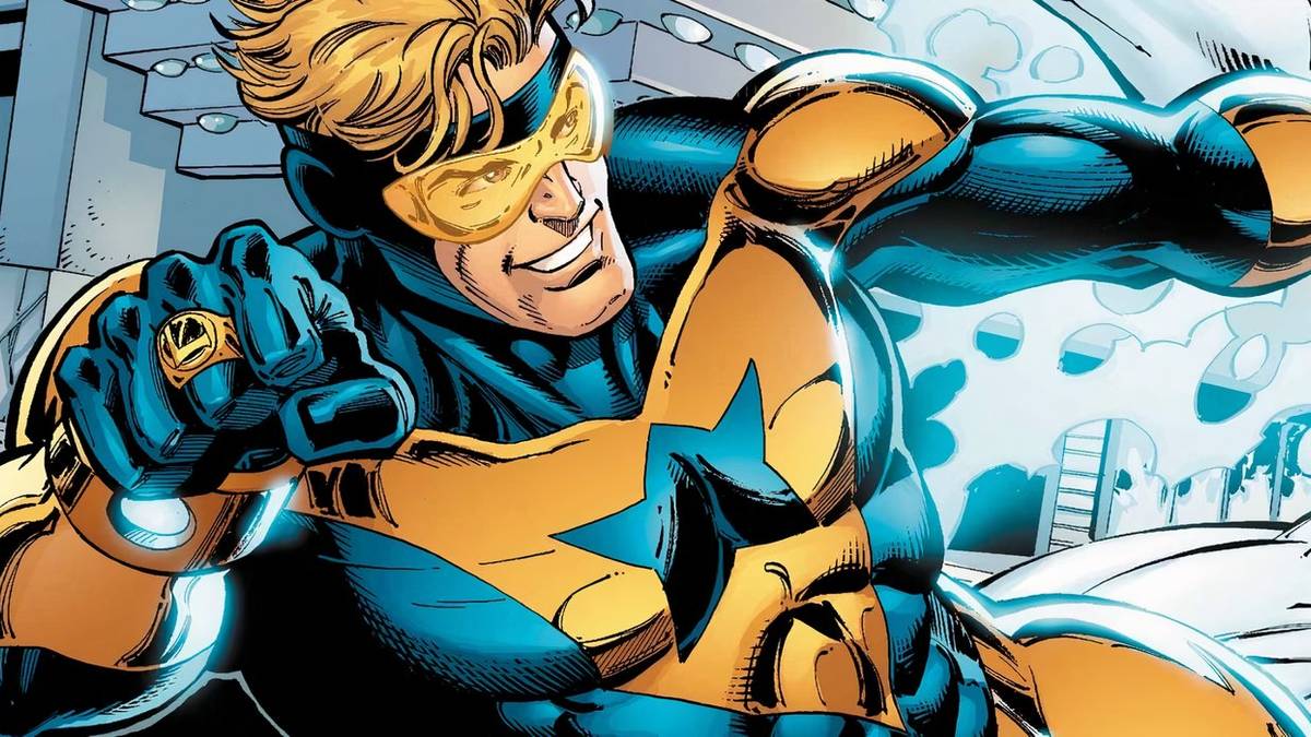 Booster Gold wearing a ring with blue energy behind him. 