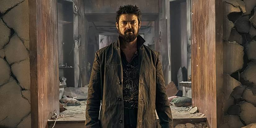 billy butcher standing in the destroyed herogasm house