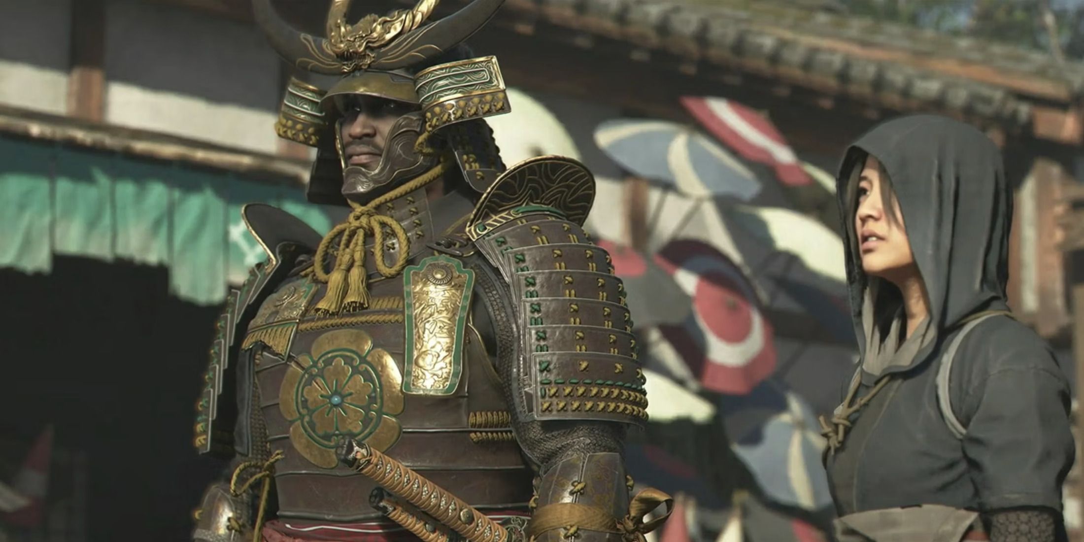 protagonists yasuke and naoe in a japanese village in assassin's creed shadows