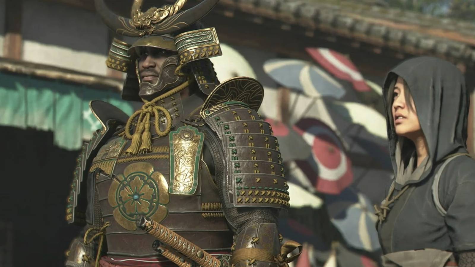 protagonists yasuke and naoe in a japanese village in assassin's creed shadows