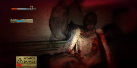 Ethan being attacked by a muscular, blood-soaked enemy in Condemned: Criminal Origins