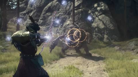 A magick archer fighting a minotaur in Dragon's Dogma 2