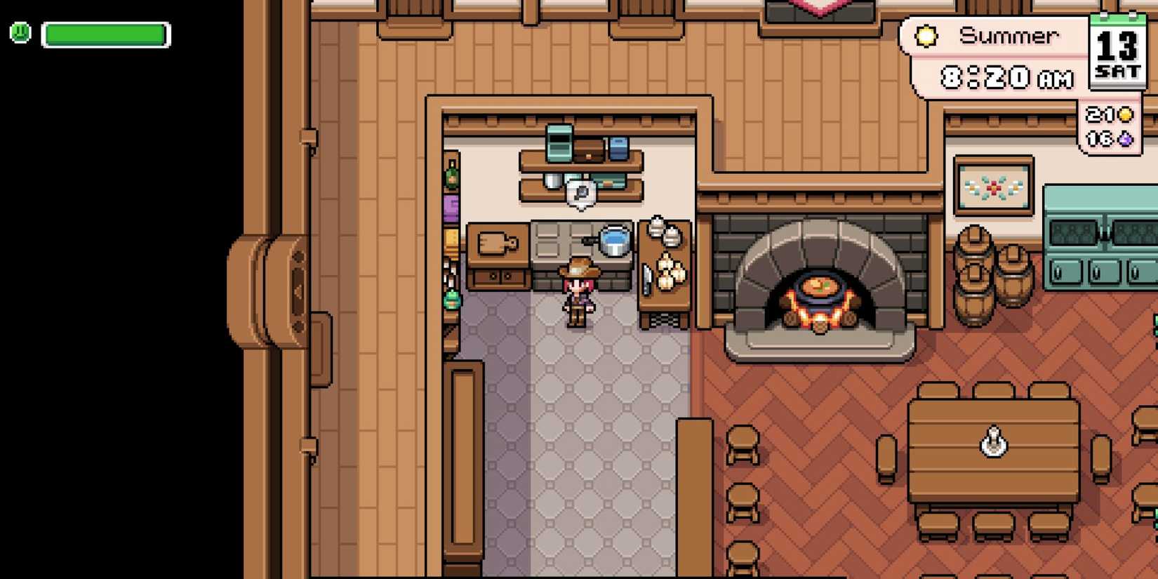 Cooking in the inn's kitchen in Fields of Mistria