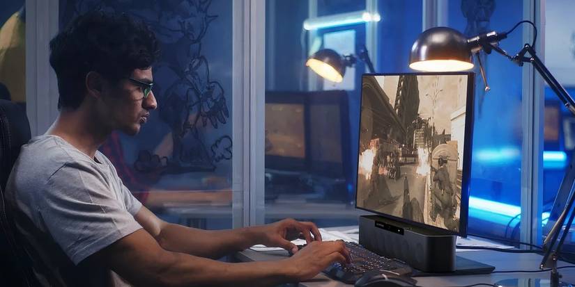 gamer with audioscenic soundbar