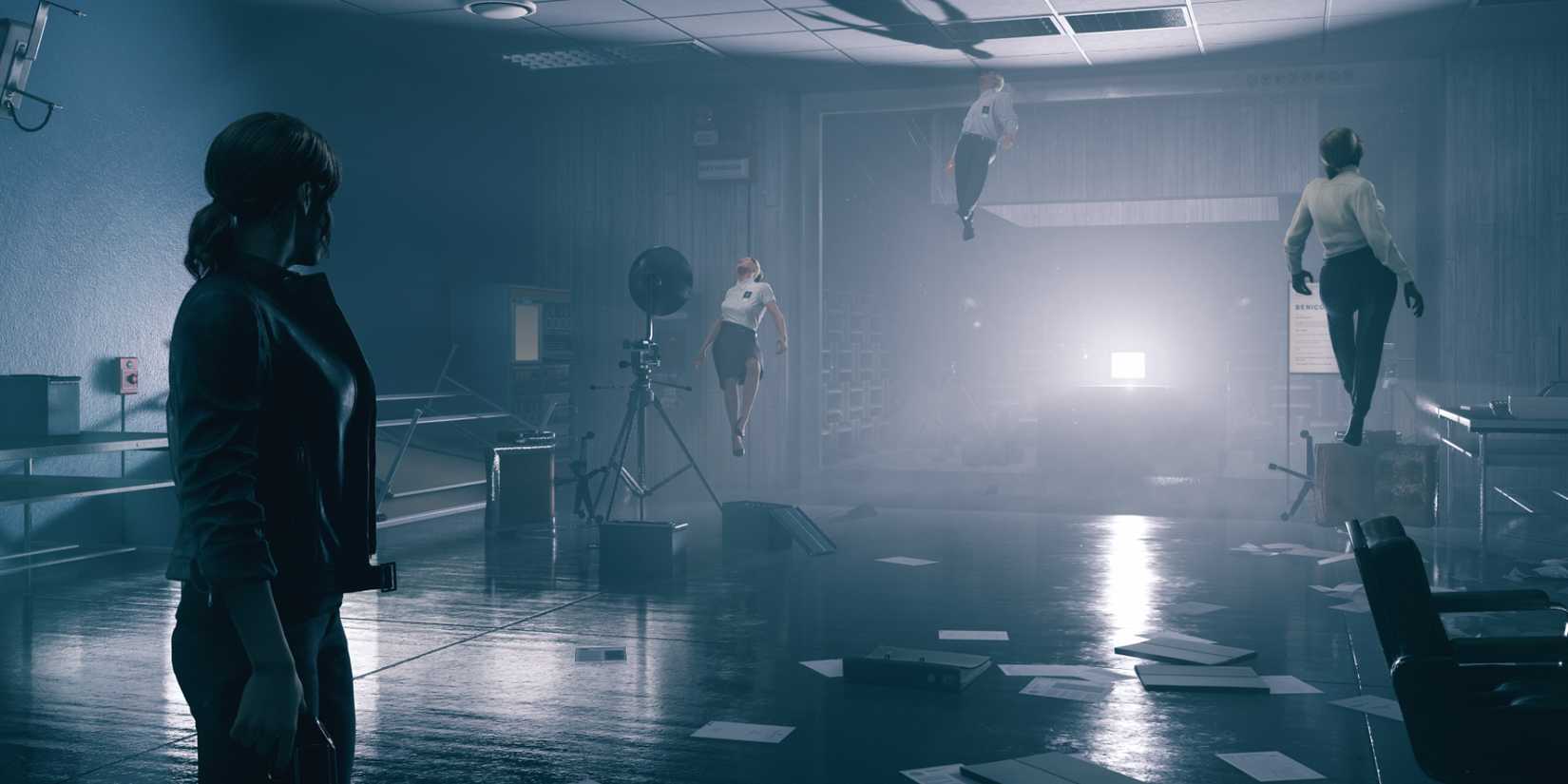 Jesse Faden walking by Oldest House in Control