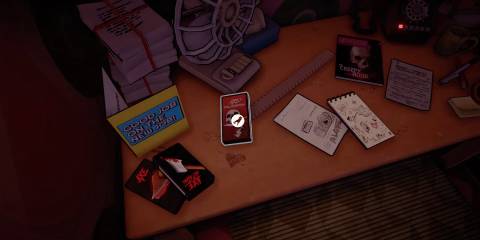 Killer Frequency desk for the intern with notes and horror tapes