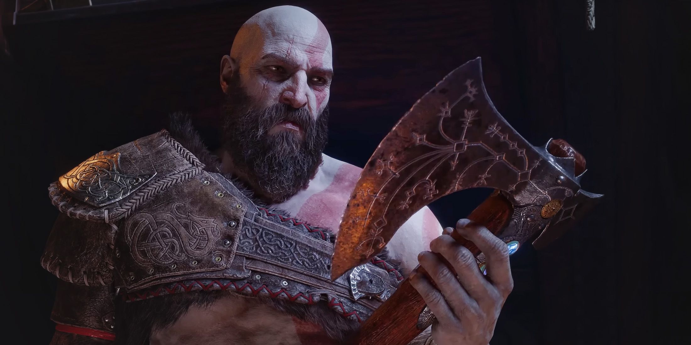 Kratos holding Leviathan Axe in God of War Ragnarok trailer screenshot