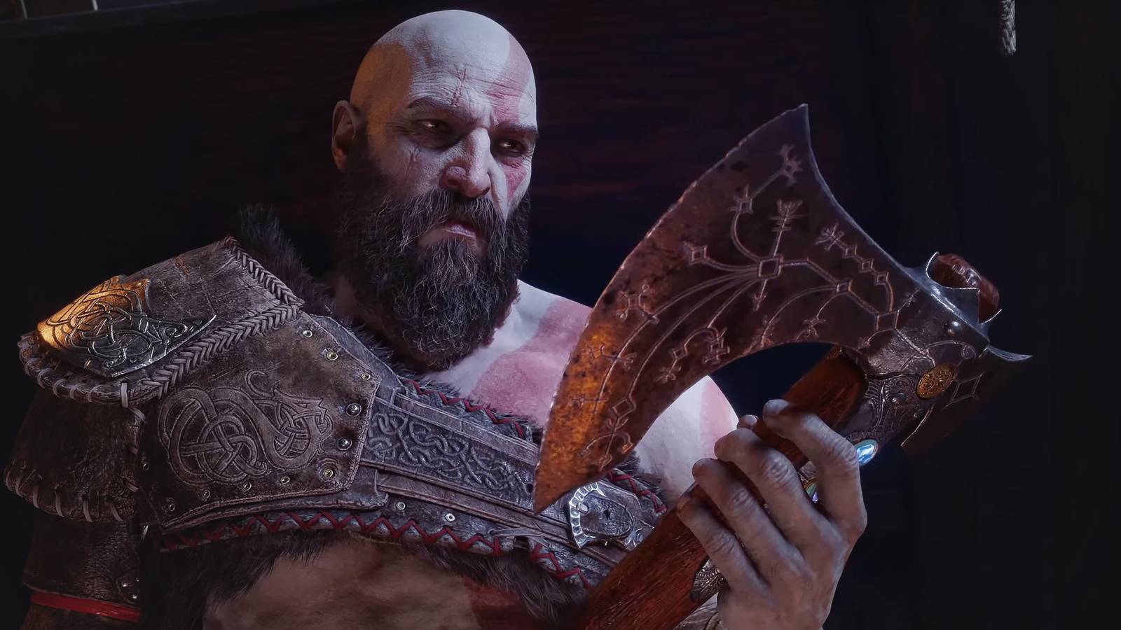 Kratos holding Leviathan Axe in God of War Ragnarok trailer screenshot
