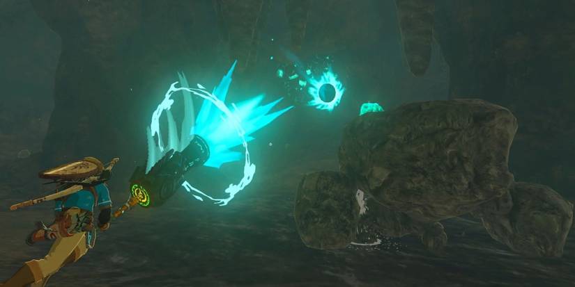 Link Using A Fused Weapon Against A Stone Talus In Legend Of Zelda Tears Of The Kingdom