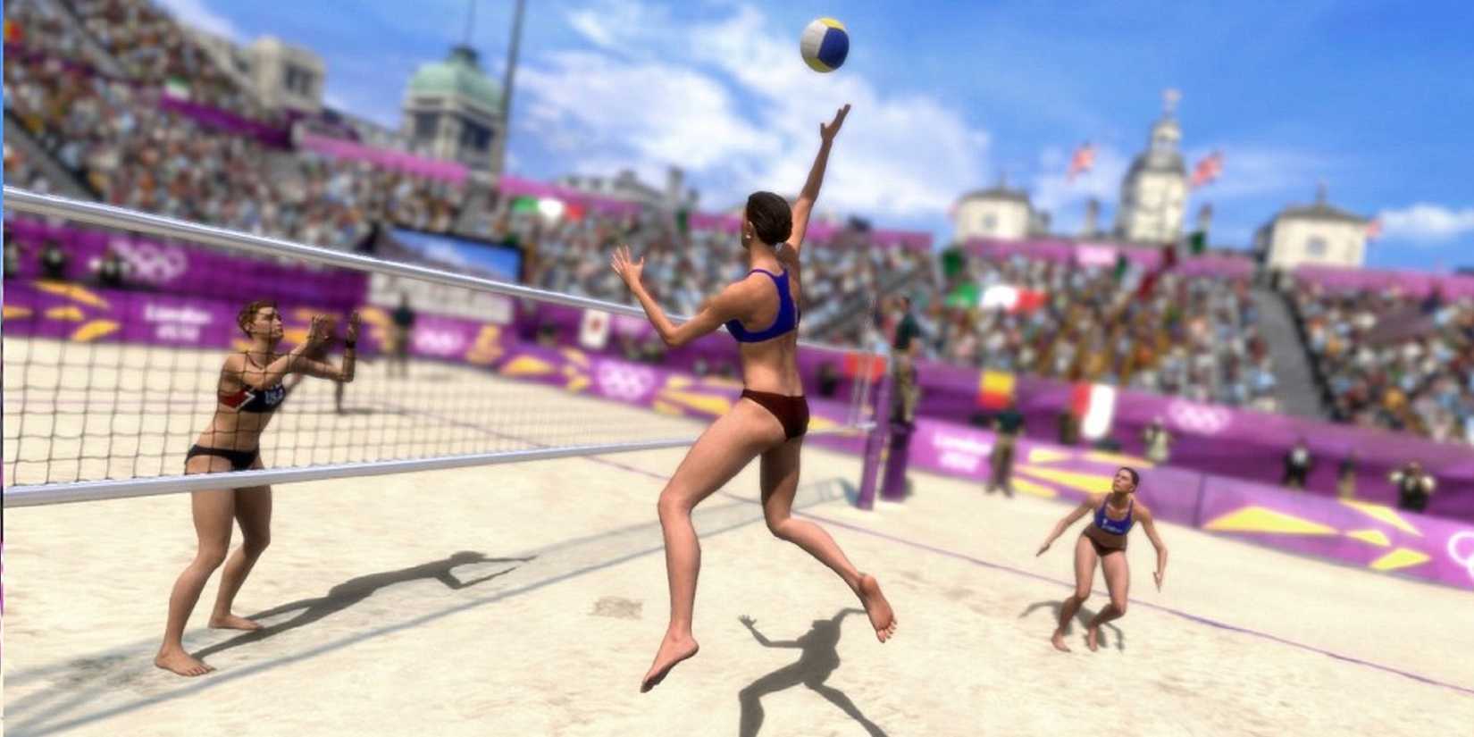 Four women playing beach volleyball in London 2012