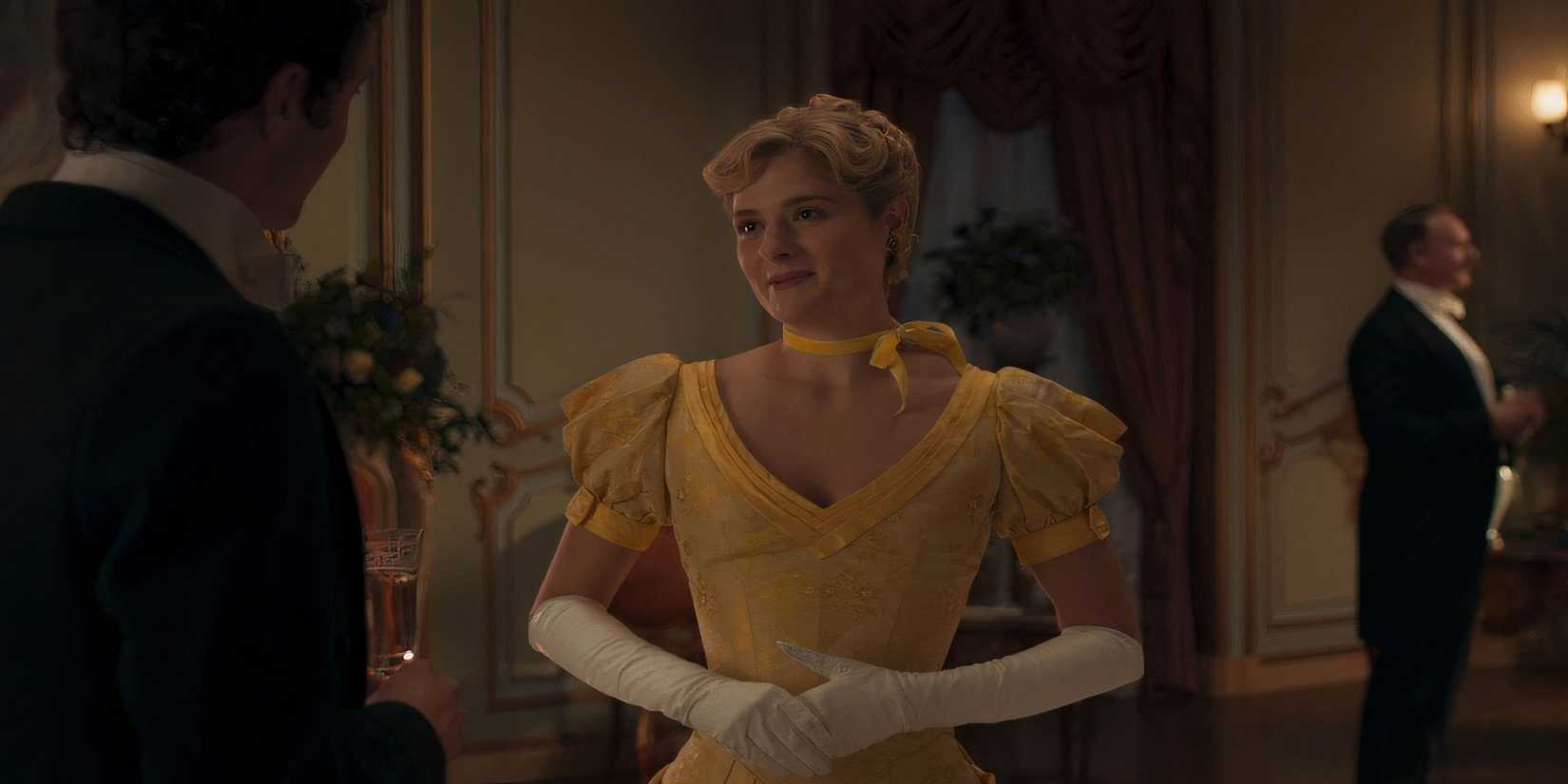 Marian Brook in a yellow dress in The Gilded Age