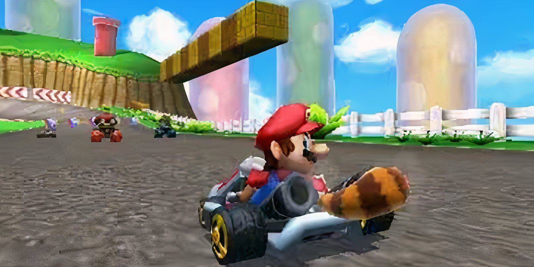 mario driving on a course in mario kart 7