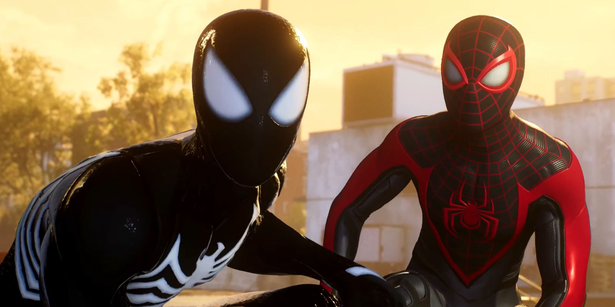 Miles Morales and Peter Parker perched together in Marvel's Spider-Man 2