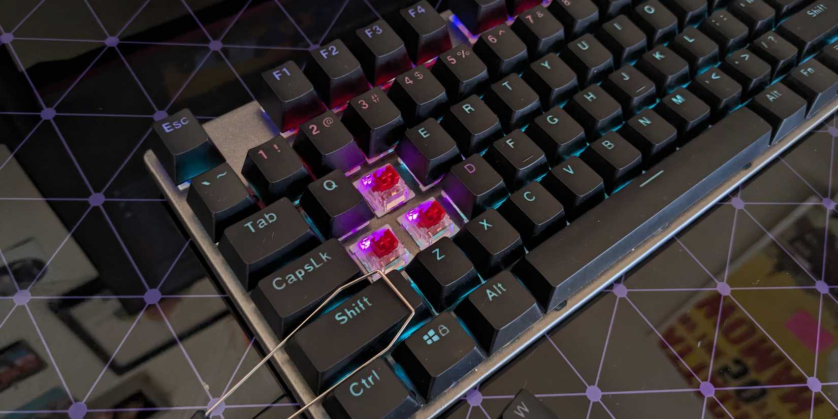 MSI Forge GK310 Keyboard with keys removed and keycap puller