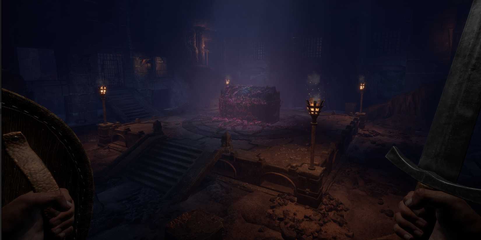 tomb surrounded by flowers and torches