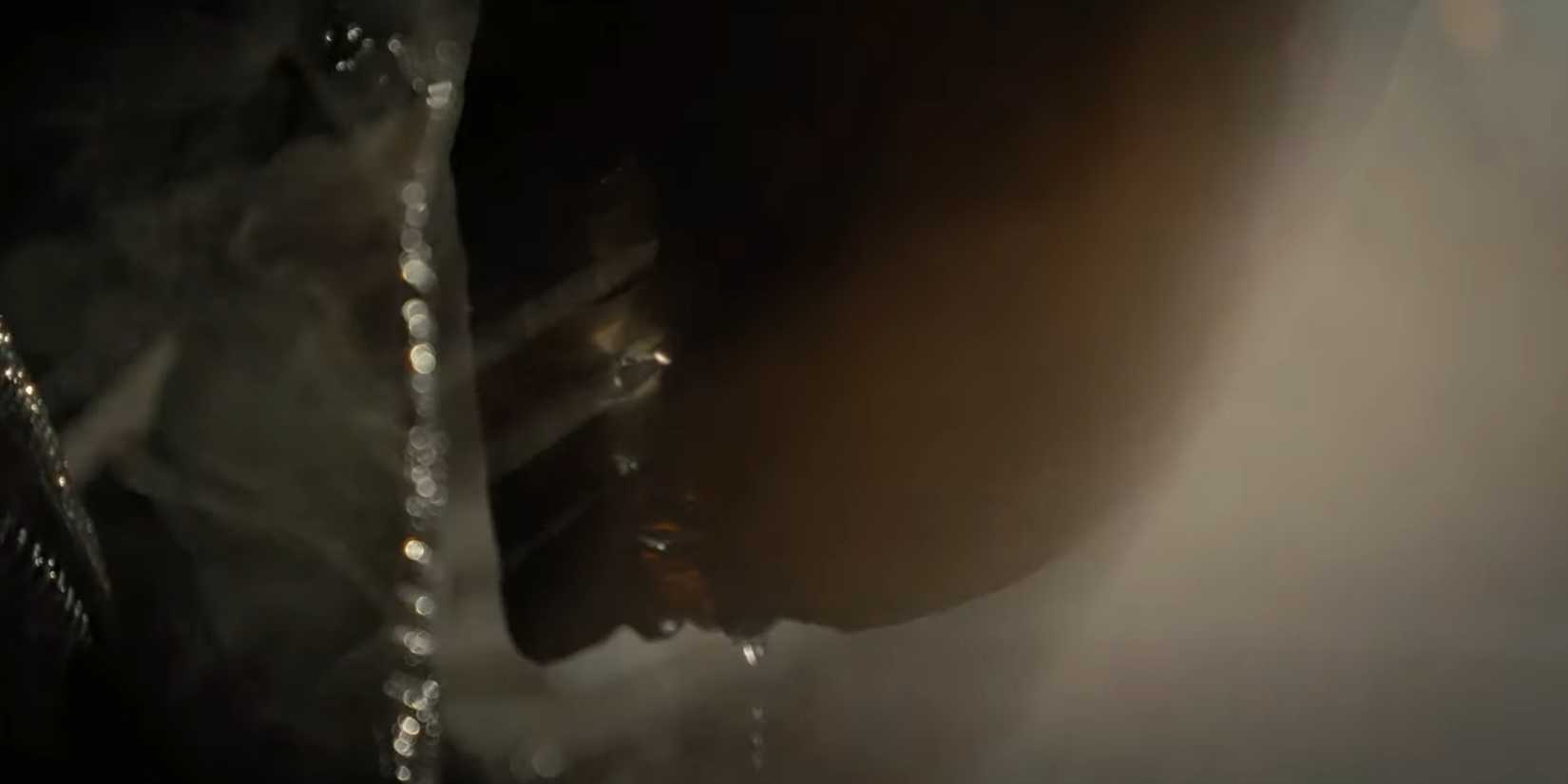 Scorched Xenomorph emerging from its cocoon in Alien Romulus