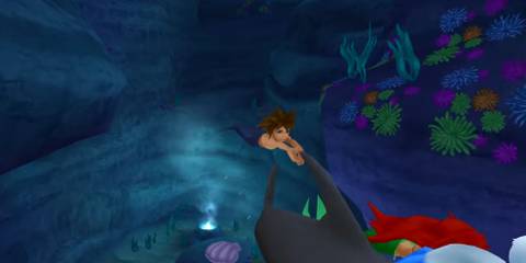 Sora, Donald and Ariel swimming on the dolphin in Atlantica.