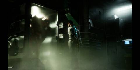 Isaac Clarke stands in front of a mirror reflecting back the image of a monster in Dead Space