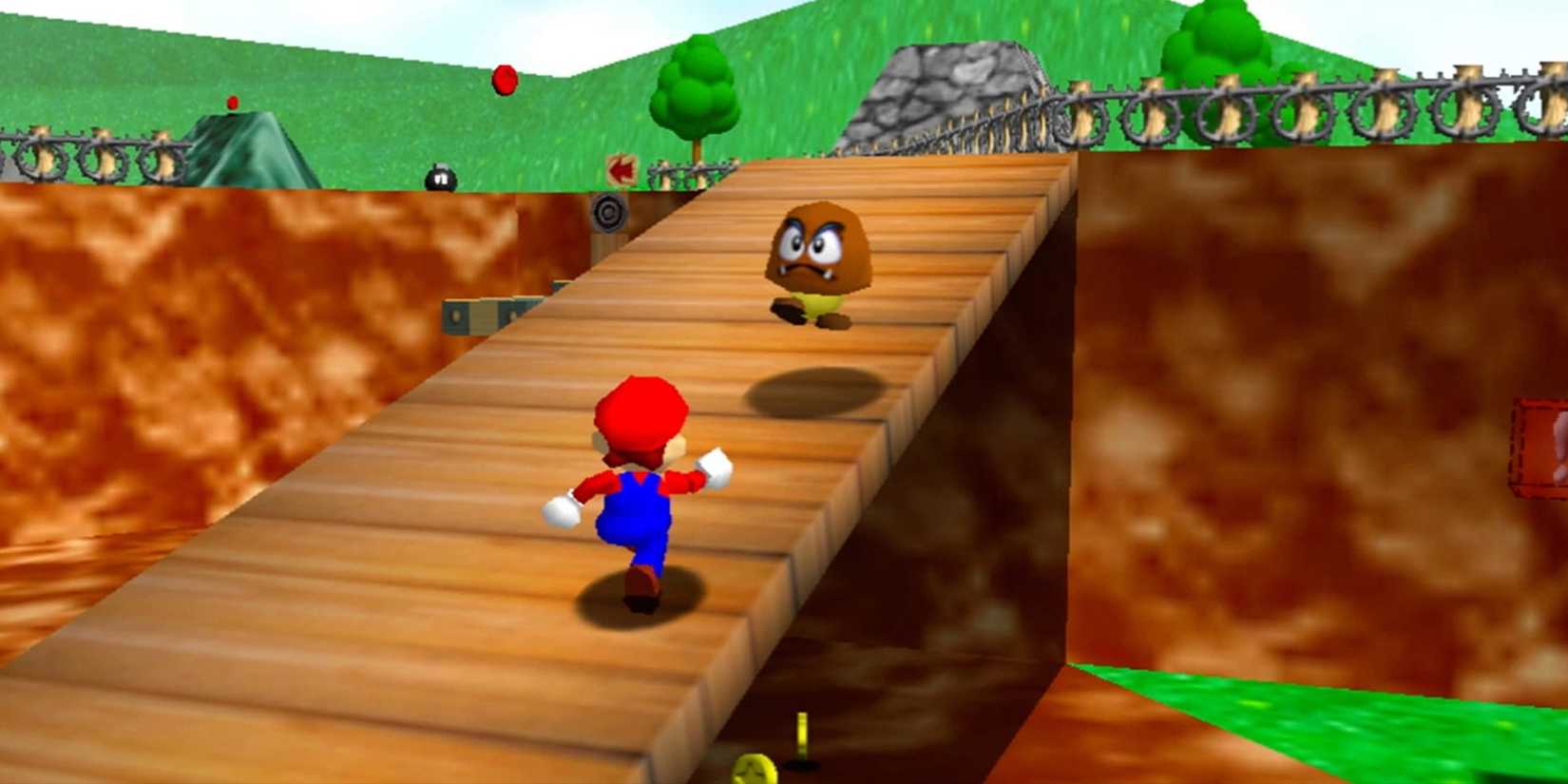 A screenshot of Mario running toward a Goomba in Super Mario 64.