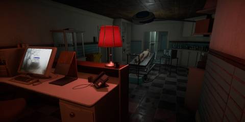 A morgue with a red lamp on an office desk and a body lying on a gurney 