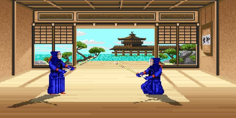 Two Kendo Fighters With Bamboo Swords Fight In A Dojo
