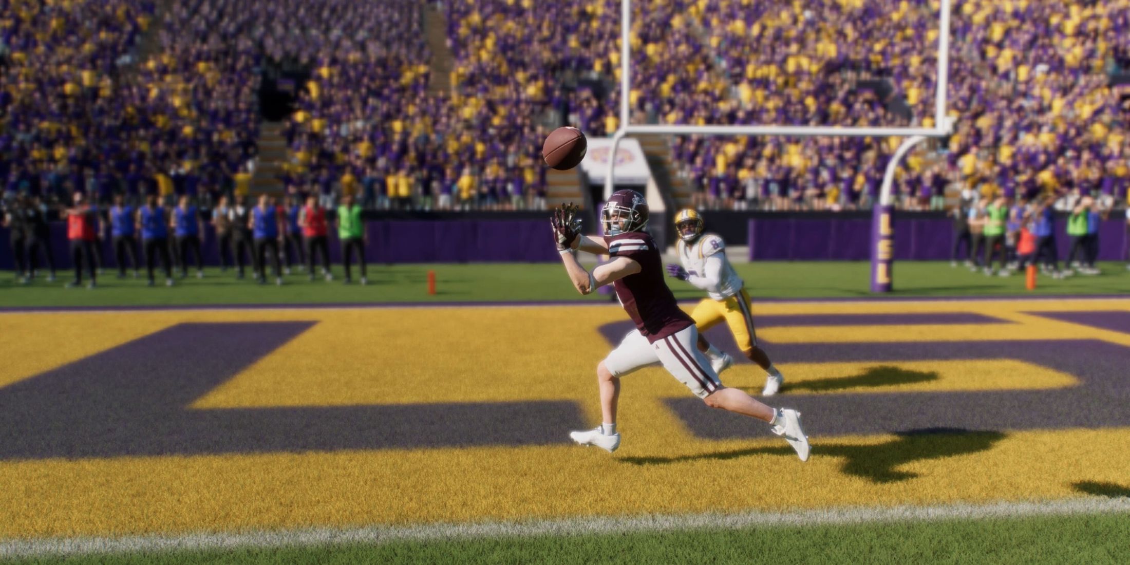 A player catching for a touchdown in College Football 25