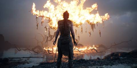 A Burning Hanging Tree With Senua In The Foreground From Hellblade Senua's Sacrifice