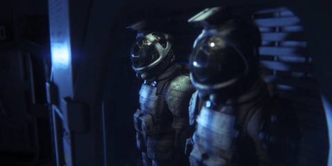 A close-up of two space suits