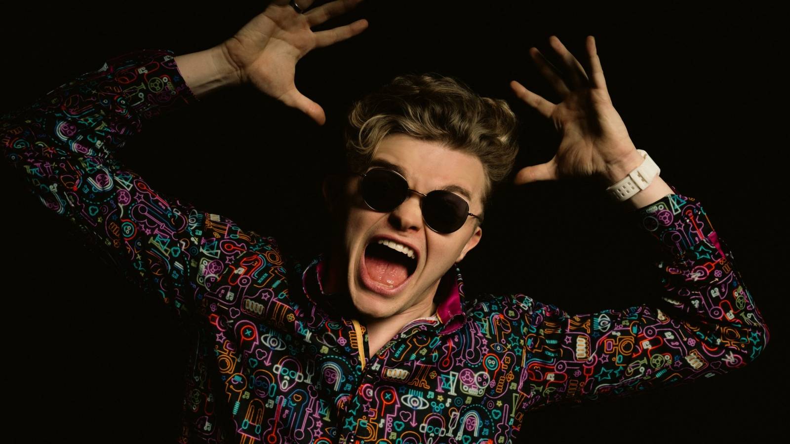 CG5 posing in front of a plain black background