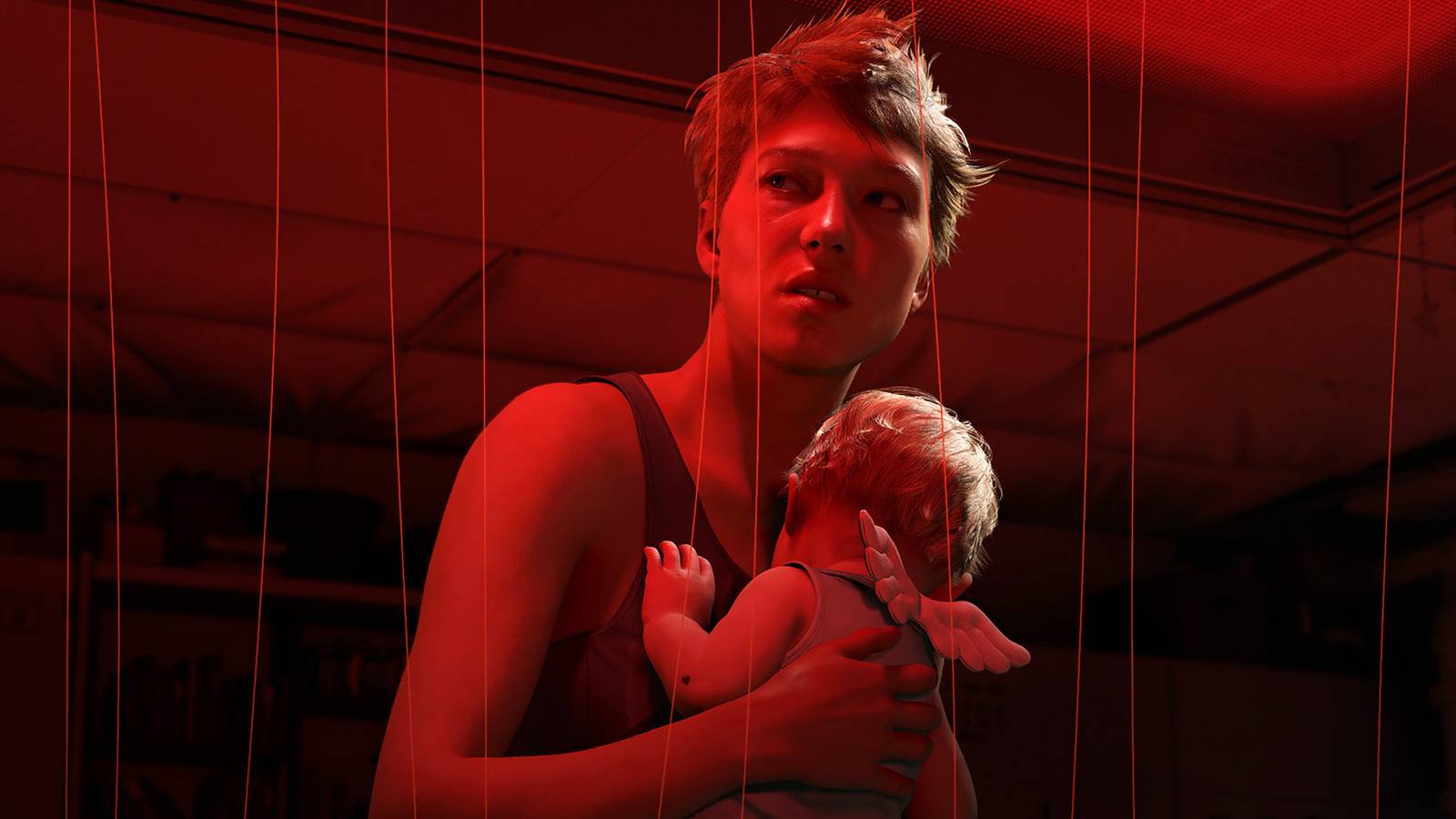 Death Stranding 2 On The Beach screenshot holding baby in red corridor