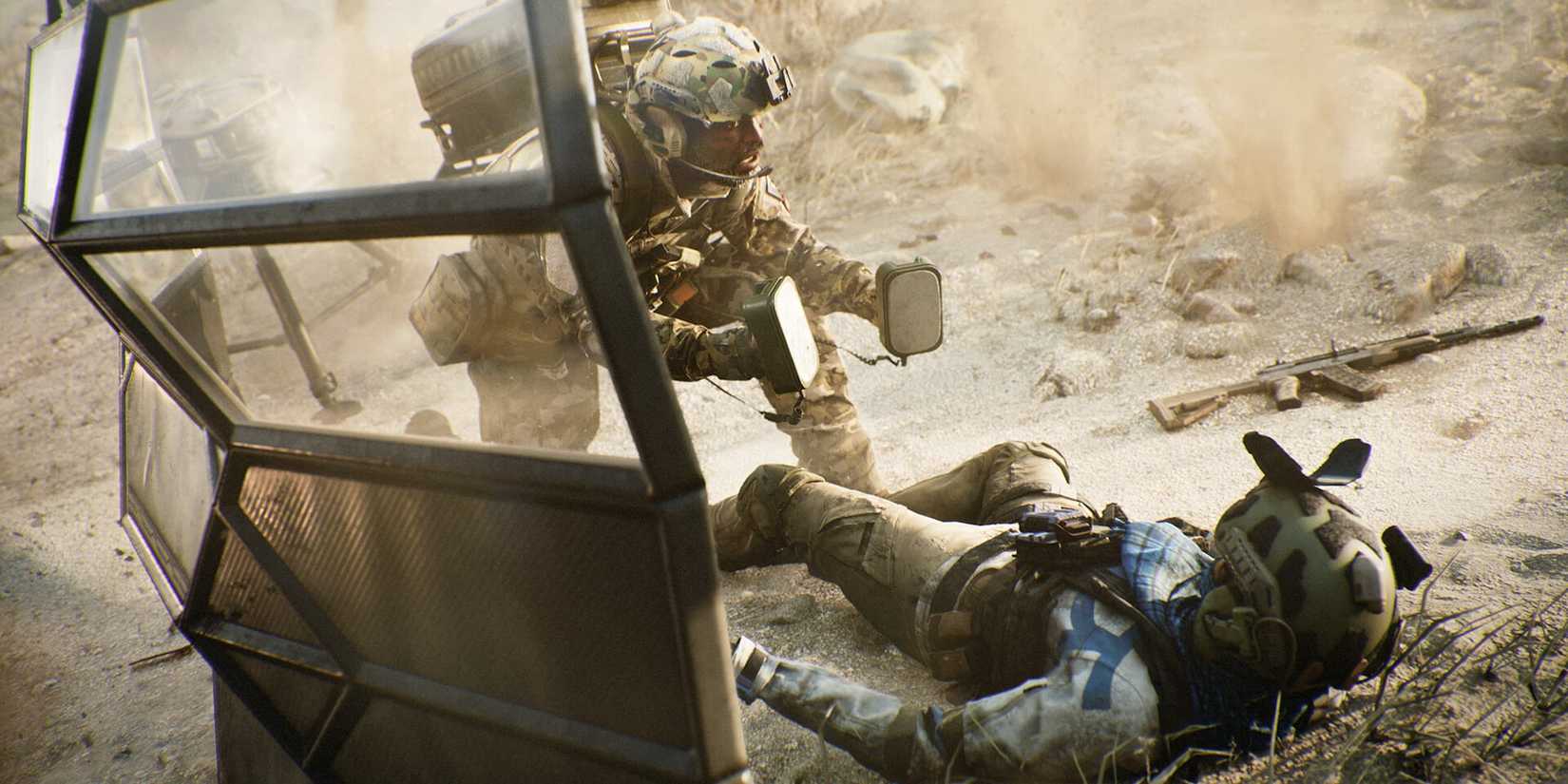 A soldier reviving a teammate with shock paddles in BF 2042