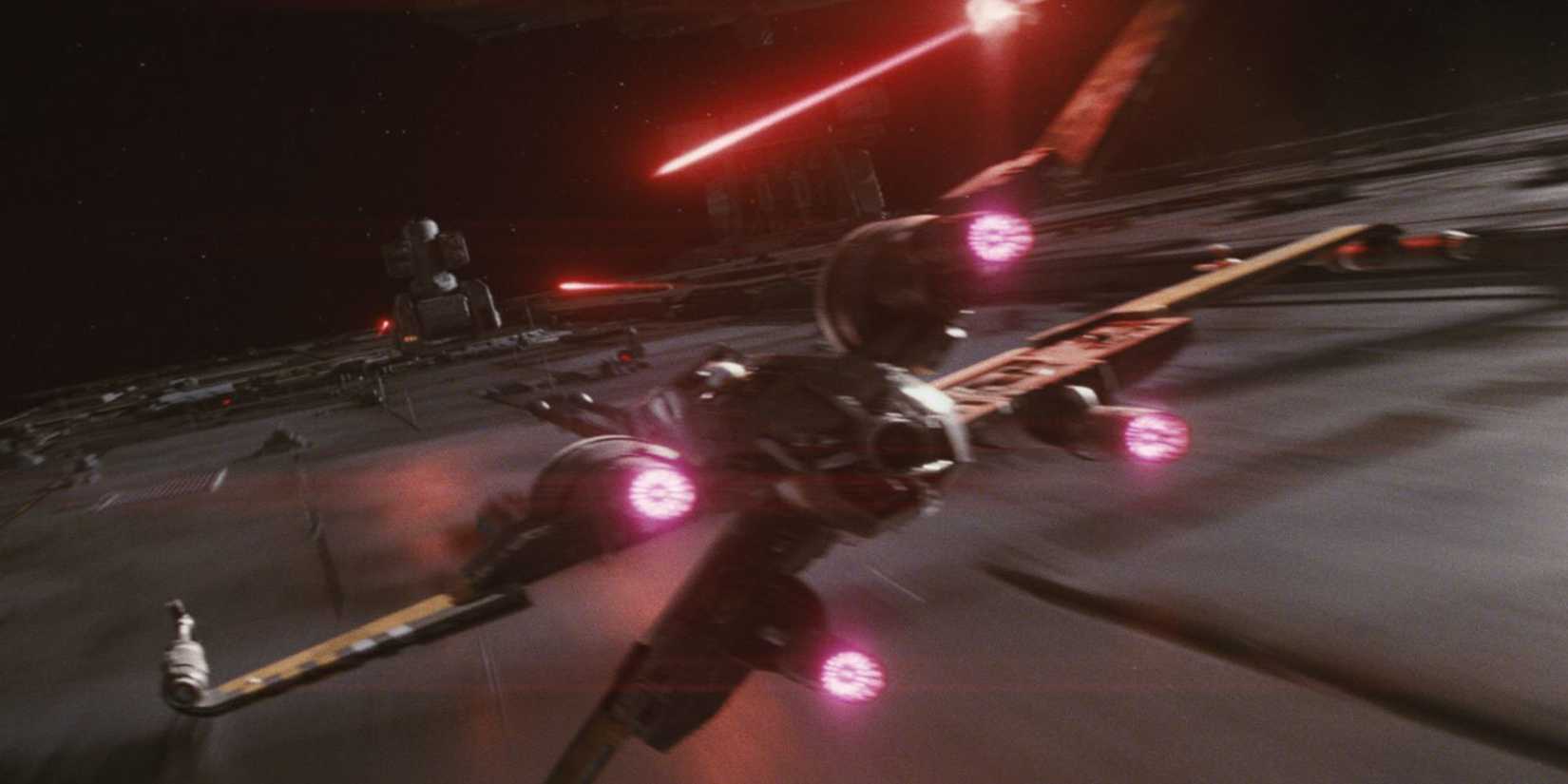 Poe Dameron's customized X Wing shooting First Order turrets