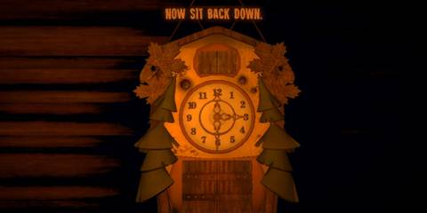 An orange cuckoo clock with 