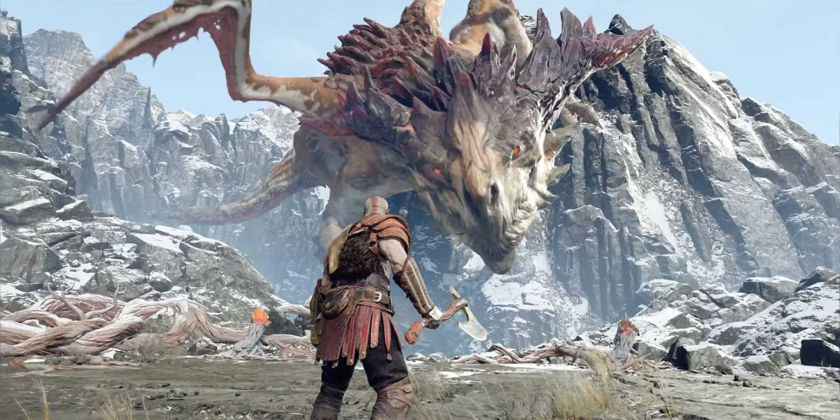 God of War (2018) - Kratos faces Hraezlyr in the mountains.