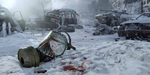 Screenshot from Metro Exodus showing a cracked, bloody gas mask in the snow.