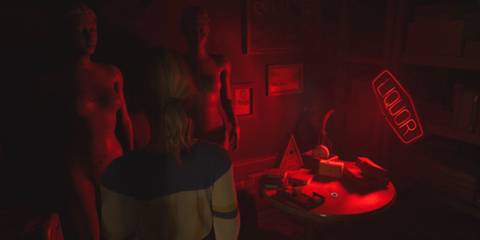 chris in the curiosity shop looking at mannequins