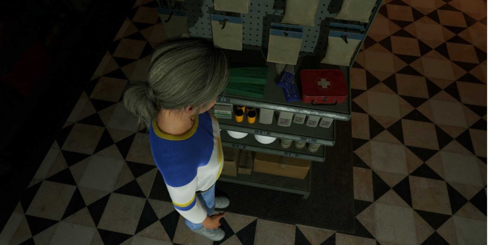 chris in the pharmacy looking at a red med kit