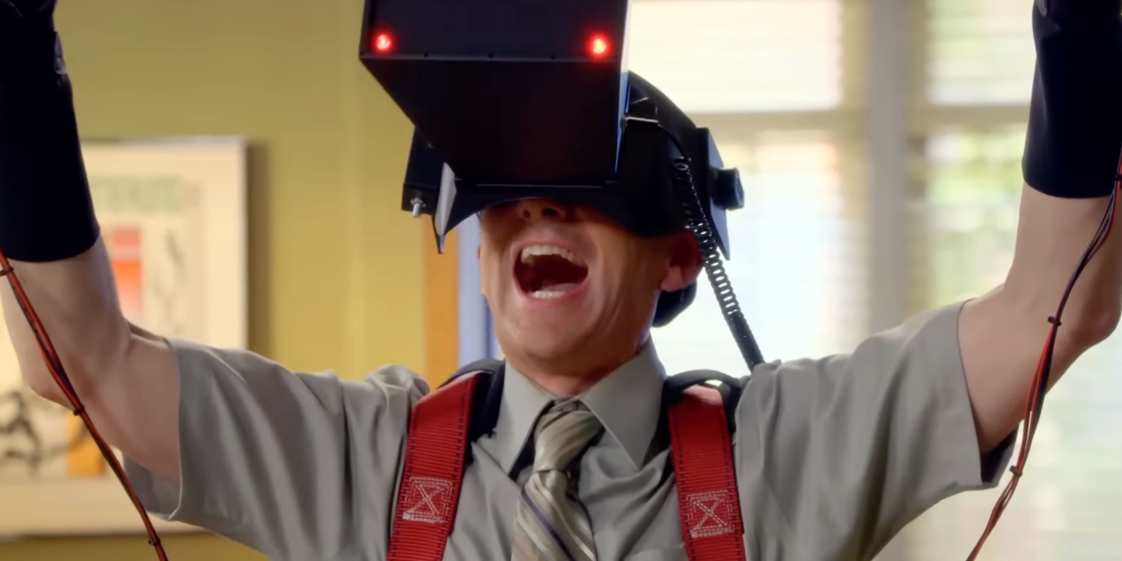 dean wearing VR gear looking triumphant