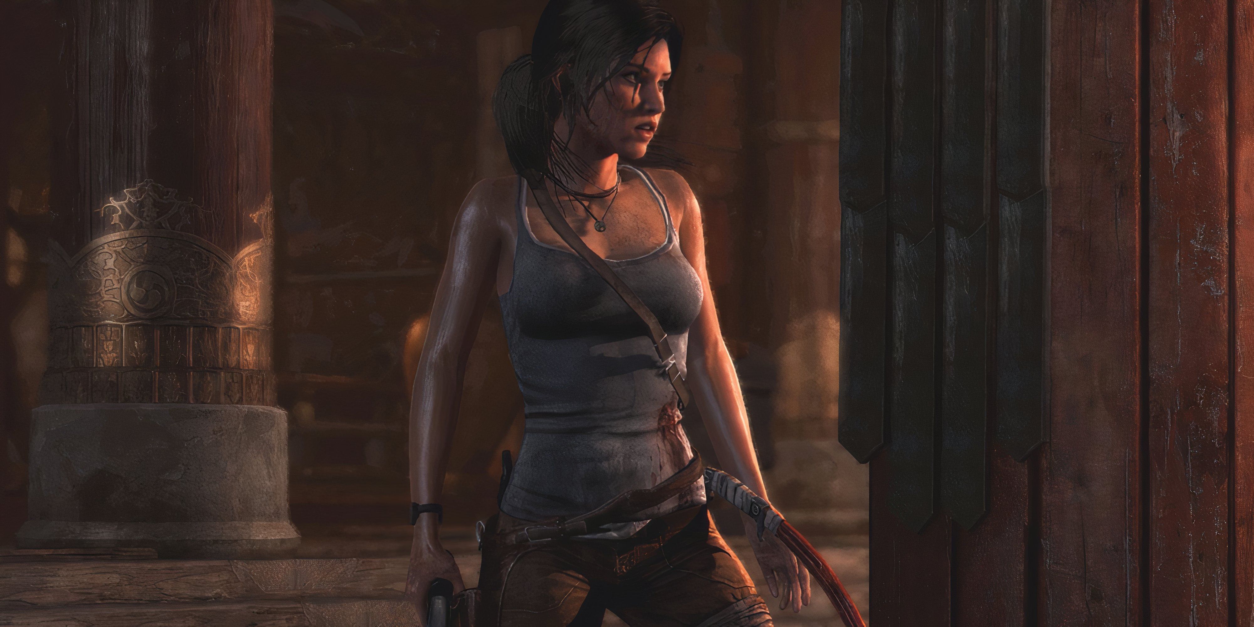 7 Linear Games That Feel Like an Open World Lara holds her weapons at ther ready