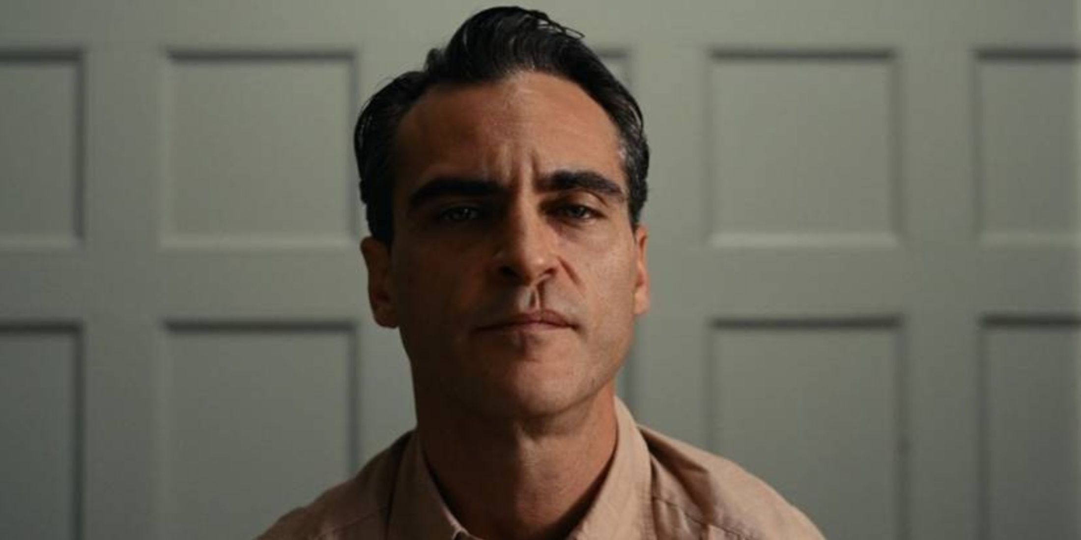 Joaquin Phoenix as Freddie Quell in The Master