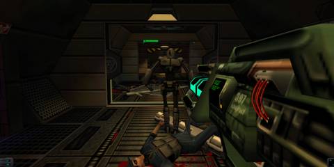 System Shock 2 player aiming weapon at robot enemy