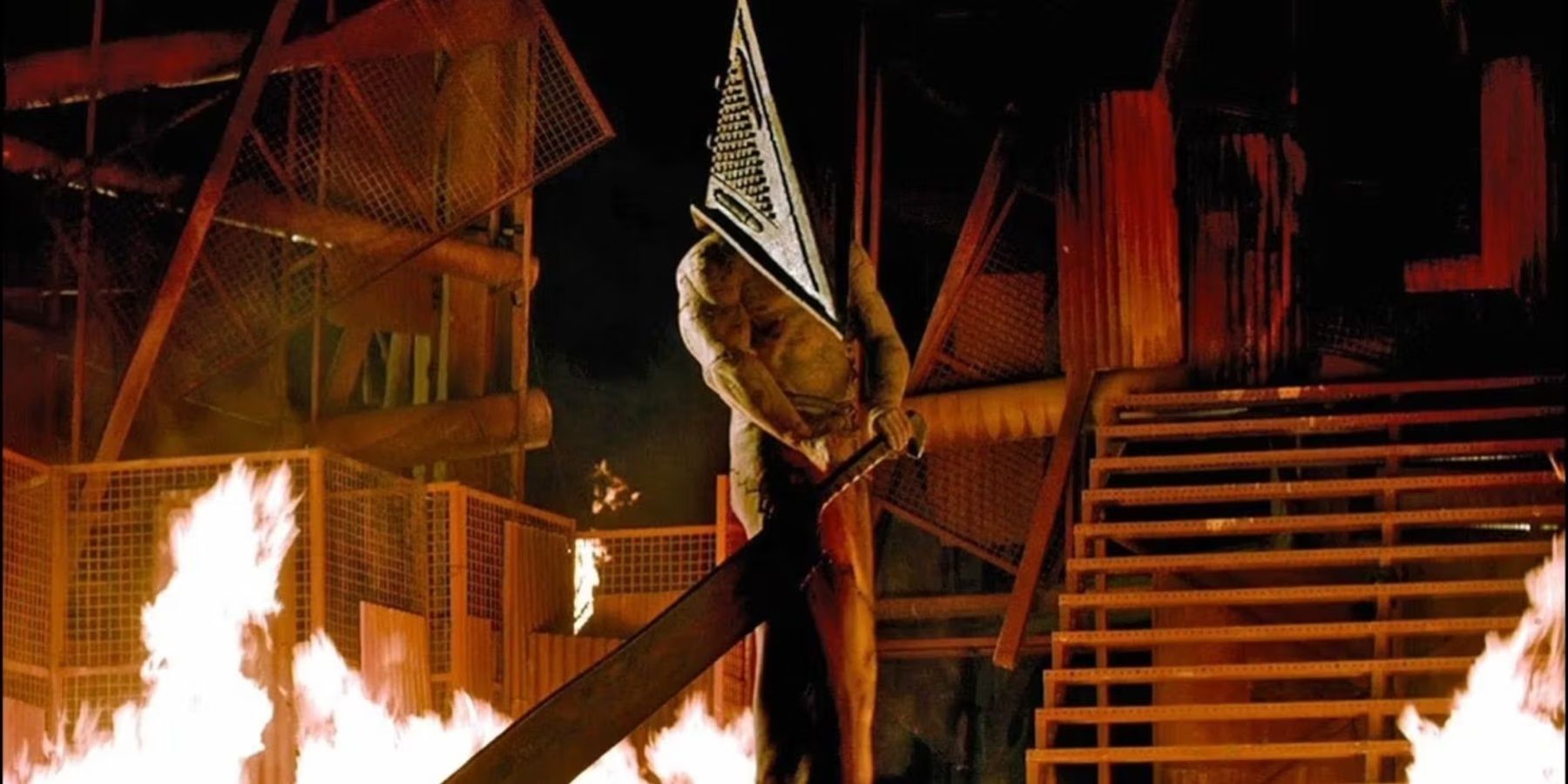 Silent Hill Movie version of Pyramid Head standing near fire