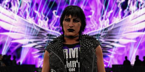 Wrestler in black with purple wings behind in WWE 2K24