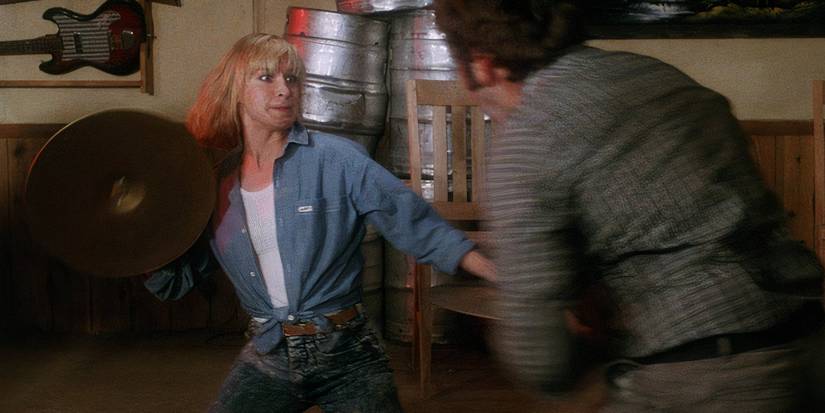 10 Most Iconic Martial Arts Actors, Ranked Cynthia Rothrock hitting someone with a frying pan (1)